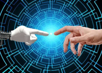 kunstig intelligens - menneskehånd møder AI-hånd